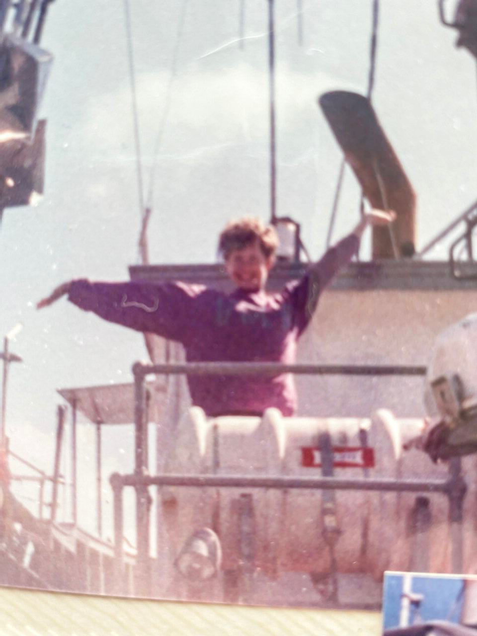 Childhood image of Sena on the Alrita fishing boat
