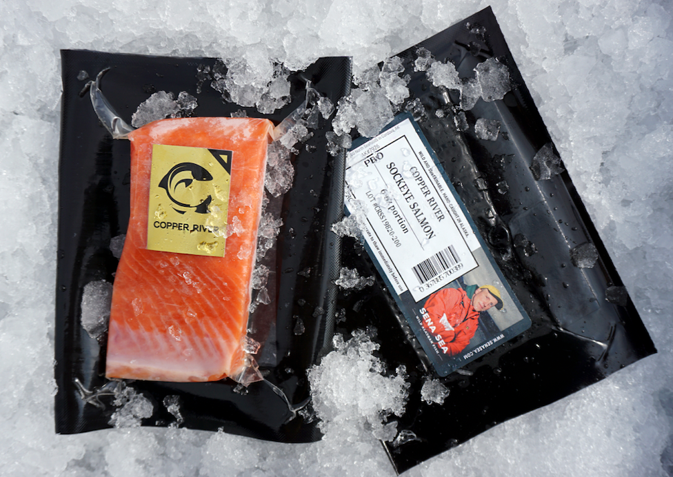 Packed Alaskan copper river sockeye salmon fillets on ice
