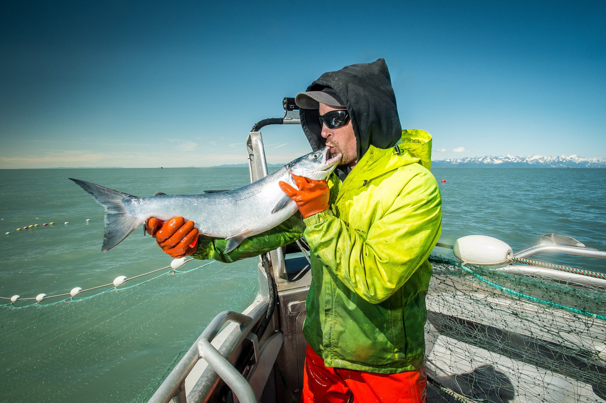 Fisherman holding a fish