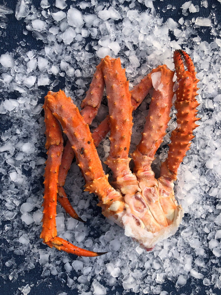 Sena Sea sustainably caught whole Crab legs displayed on crushed ice